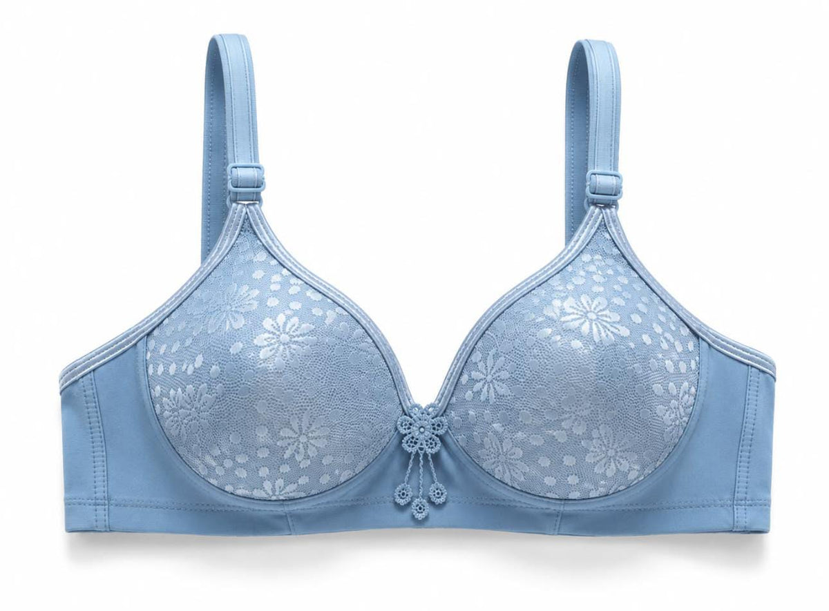 Blue padded wireless floral lace bra, highlighting its natural shape and invisible smooth finish.