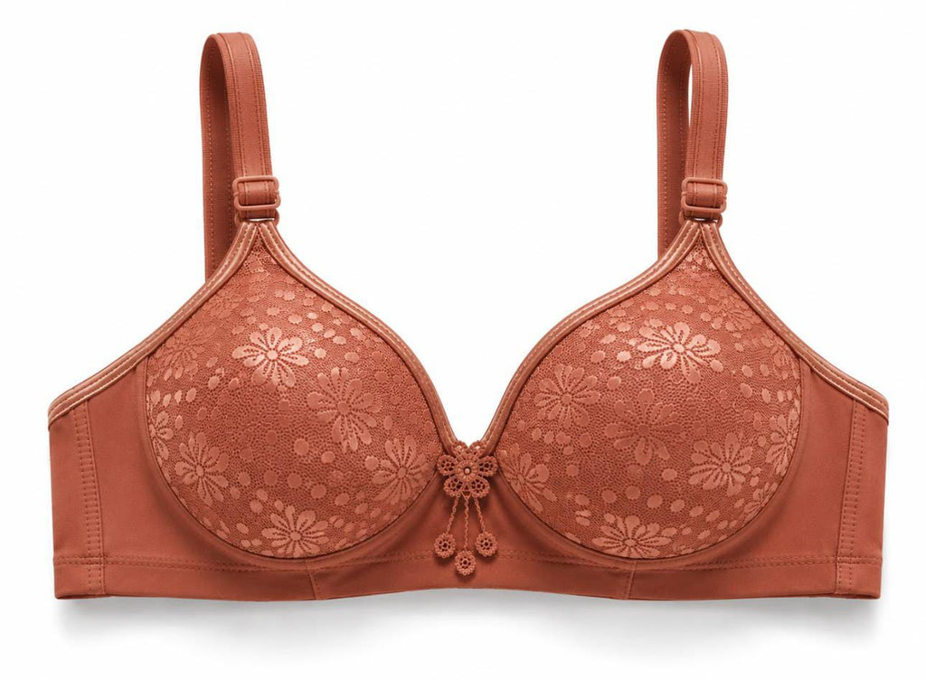 Dusty rose wireless floral lace foam bra showing its soft padded shape and textured lace pattern.