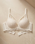 Ivory light padded fancy bra with floral lace and net detailing